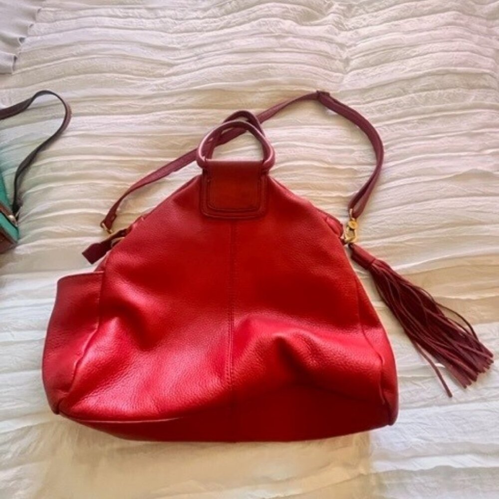Red Hobo Brand hobo bag with shoulder strap, pockets, gorgeous! Tassle is darlin
